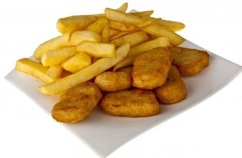 Chicken nuggets and hot chips on a plate