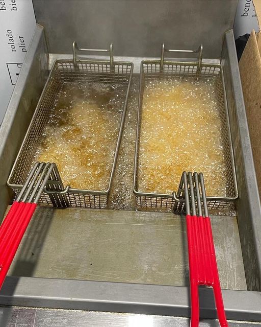 Two deep fryers ready for hot chips