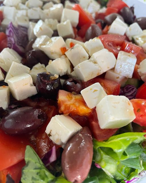 Close-up of fresh Greek salad with feta and olives