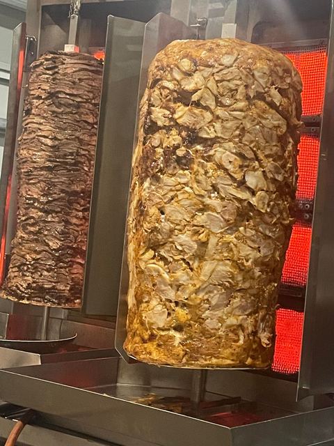 Lamb and chicken doner machines side by side