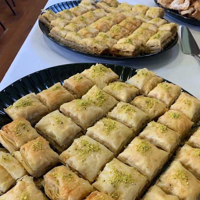 Trays of Turkish baklava with pistachio